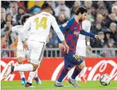  ?? Picture: JUAN MEDINA/REUTERS ?? BATTLE: Barcelona’s Lionel Messi in action against Real Madrid’s Casemiro at the Santiago Bernabeu, Madrid.
