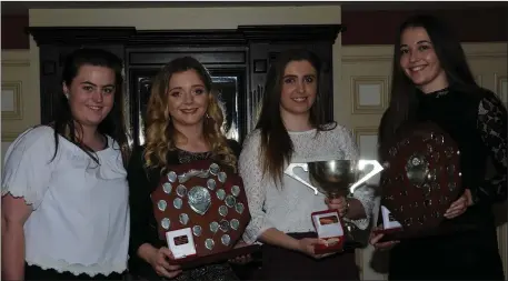  ??  ?? Cassandra Myers, County Youth Officer, with winners Megan O’Connor, Cora O’Mahony and Aoife Doyle at the County Community Games annual awards night in Castleisla­nd