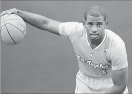  ?? Allen J. Schaben Los Angeles Times ?? CHRIS PAUL, posing for media day portrait Sept. 30, appears more muscular and says he will do what it takes to adjust to the tweaks in his role as facilitato­r.