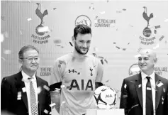  ?? — Reuters photo ?? (From left) AIA Group chief executive and president Designate Ng Keng-hooi, Tottenham Hotspur goalkeeper Hugo Lloris and Hotspur chairman Daniel Levy during an event in Hong Kong.
