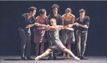  ??  ?? BIANCA BULLE, front, gets a little help from Brown, left, Jasmine Perry, Tigran Sargsyan, Leah McCall and Dallas Finley in “Lickety-Split,” part of the ballet troupe’s “Modern Moves” at the Alex Theatre in Glendale.