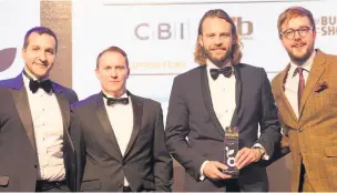  ??  ?? Greg Cox, founder of Quint, picking up the Digital Business of the year award at the Amazon Growing Business Awards, in 2017.