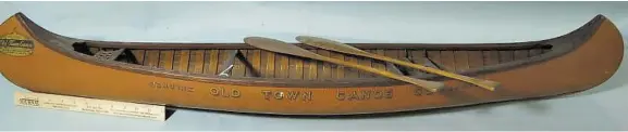 ?? GUYETTE & DEETER ?? Old Town Canoe Co. salesman's sample sold at auction for a hammer price of $24,000. The 4 foot display model likely dated to the 1920’s.