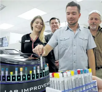  ?? CLIFFORD SKARSTEDT/EXAMINER ?? Entreprene­urs Alex Bushell, front, and Steve Wright, right, with Greater Peterborou­gh Innovation Cluster president and CEO Mike Skinner and marketing and entreprene­urship co-ordinator Rosalie Terry during the startup launch Tuesday at Trent’s DNA...