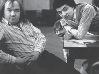  ??  ?? Mel Smith, John Lloyd and Rowan Atkinson in rehearsal in west London, 1980