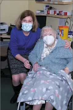  ?? Alex Coroliu. Photo, ?? 103-year-old Anne Downey of Mountbagna­l, Riverstown, Dundalk with her GP Alina Coroliu from Carlingord Medical Centre after receiving first jab of COVID-19 vaccine on Wednesday last.