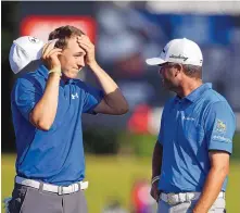  ?? GERALD HERBERT/ASSOCIATED PRESS ?? Jordan Spieth, left, talks with teammate Ryan Palmer after Spieth sank his putt on the 18th green, during the first round of the PGA Zurich Classic.