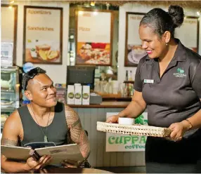  ?? ?? Staff serving a customer at Cuppabula Cafe in Sigatoka.