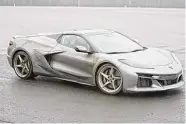  ?? Carlos Osorio/Associated Press ?? The 2024 Corvette E-Ray, the fastest ever made, is a gas and electric hybrid of the iconic sports car with front wheels running on a battery.