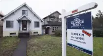  ?? CANADIAN PRESS FILE PHOTO ?? Home sales across Canada fell 6.2 per cent in May compared to April.