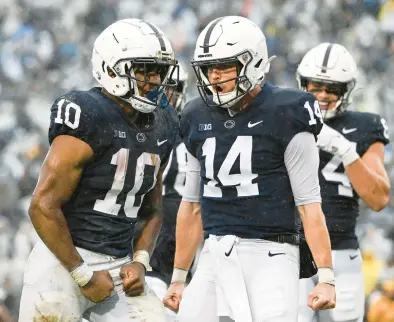  ?? BARRY REEGER/AP ?? Penn State beat Northweste­rn 17-7 in the rain on Saturday in State College.