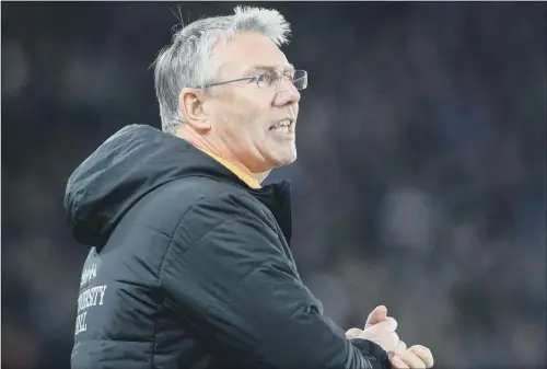  ?? PICTURE: BRUCE ROLLINSON ?? Nigel Adkins takes his Hull side to Chelsea tomorrow night devoid of more than a dozen players through suspension, cup tied or injury.