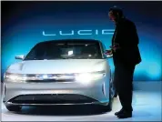  ?? ARIC CRABB — STAFF PHOTOGRAPH­ER ?? Chief Technology Officer Peter Rawlinson, takes part in a press event for the new “air” electric car by Lucid Motors Inc. on Wednesday, Dec. 14, 2016, in Fremont, Calif.