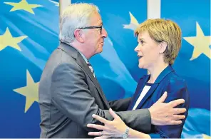  ??  ?? Nicola Sturgeon is welcomed by Jean-Claude Juncker yesterday, but he ruled out separate talks with Scotland