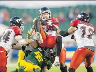  ?? GETTY IMAGES ?? Simon Charbonnea­u- Campeau, centre, recovers an onside kick earlier this season in Edmonton. The receiver has recovered from a broken leg and hopes to play in the Grey Cup if Calgary makes it that far.