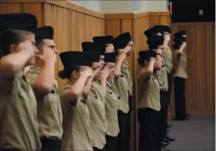  ?? MARIAN DENNIS — DIGITAL FIRST MEDIA ?? Members of the NJROTC lined the walls of the Owen J. Roberts High School auditorium Friday in celebratio­n of Veterans Day. The school honored veterans with a ceremony and luncheon for the 13th year Friday.