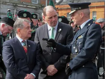  ??  ?? Chief Superinten­dent John Roche with Deputy Brendan Howlin and Minister Paul Kehoe during the 1916 commemorat­ions in Enniscorth­y two years ago.