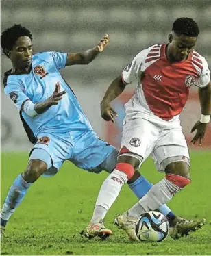  ?? /GALLO IMAGES / ASHLEY VLOTMAN ?? Azola Jakalashe of Cape Town Spurs gets the better of Tlou Nkwe of Polokwane City in previous action.