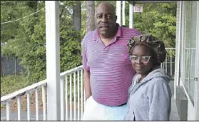  ?? R. J. RICO — THE ASSOCIATED PRESS ?? Dana Williams and his daughter De’mai Williams stand outside a low- cost hotel in Atlanta on May 18. The two have been looking for an affordable place to live ever since they were evicted from their twobedroom apartment in April.