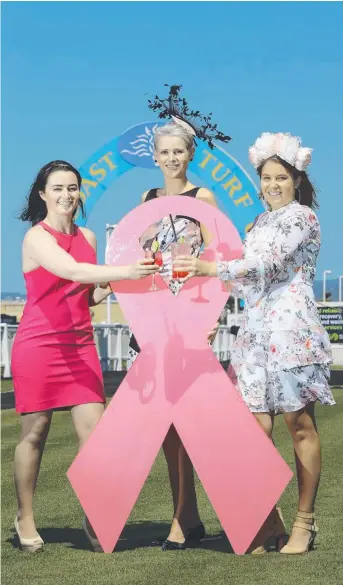  ?? Picture: GLENN HAMPSON ?? Gold Coast trainer Angela Plumb, breast cancer survivor Sally Spencer and Ellie Hughes get ready for the Pink Ribbon Cup raceday at Gold Coast Turf Club tomorrow.