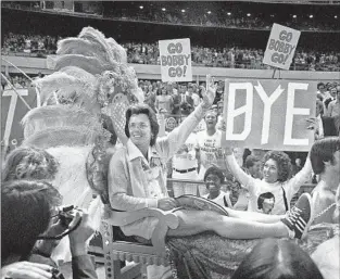  ?? ?? KING was carried into the match on a chair borne by four college athletes. Despite the theatrics, King said she knew the import of the match for advancing women in sports and society.