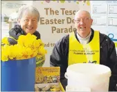  ?? (Pic: The Avondhu Archives) ?? Isabel Smith and Micheal Hennessy in Tesco, Mitchelsto­wn, collecting for Daffodil Day in 2013.