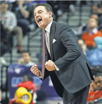  ?? BRAD PENNER, USA TODAY SPORTS ?? A strippers- and- prostituti­on scandal resulted in a suspension for Rick Pitino and imperiled Louisville’s 2013 national title.