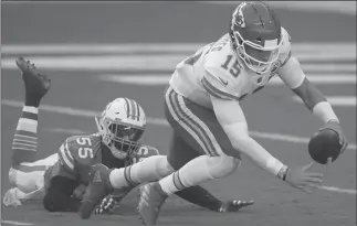  ?? LYNNE SLADKY/AP ?? Dolphins LB Jerome Baker sacks Chiefs QB Patrick Mahomes during Sunday’s game in Miami Gardens, Fla.