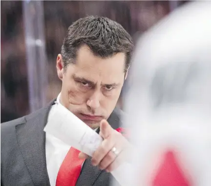  ?? NILS PETTER NILSSON/OMBRELLO/GETTY IMAGES ?? Senators head coach Guy Boucher ran his charges hard during practice Tuesday.