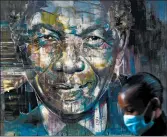  ?? NARDUS ENGELBRECH­T/AP ?? A woman walks past a mural of former President Nelson Mandela on Saturday in Cape Town, South Africa. The U.N. chief’s address marked Mandela’s birthday.