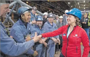  ?? CP PHOTO ?? B.C. Liberal Leader Christy Clark greets workers as she tours Supreme Steel in Delta, B.C., Thursday.