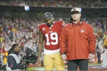  ?? AP photo ?? Niners wide receiver Deebo Samuel walks off the field after an injury during the first half of Saturday’s divisional playoff game against the Packers.