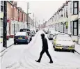  ??  ?? The snow makes for an almost Lowryesque scene in Guisboroug­h, North Yorks