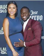  ?? AP ?? Kevin Hart and his pregnant wife Eniko pose at Hart’s ‘Laugh Out Loud’ new streaming video network launch event in California last May.