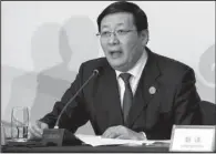  ?? AP/ROLEX DELA PENA ?? Chinese Finance Minister Lou Jiwei speaks Saturday at a news conference in Shanghai after meetings of finance ministers and central bankers from Group of 20 nations.