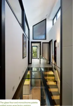  ??  ?? The glass floor and monochrome palette added some wow factor upstairs