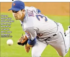  ?? PHOTO BY AP ?? Steven Matz wins fifth straight game and knocks in a run as Mets edge Dodgers.