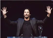  ?? Ethan Miller / Getty Images ?? Keanu Reeves accepts an award at the CinemaCon Big Screen Achievemen­t Awards earlier this month. When his sister showed him a trailer for “Keanu,” Reeves just had to get involved.