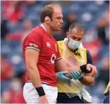  ??  ?? Lions captain Alun Wyn Jones leaves the field after being injured against Japan