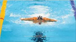  ?? PICTURES: MARTIN VAN STADEN ?? Michael Phelps in action in the pool. He has won four gold medals already this year, adding up to a combined 22 in his Olympics career.