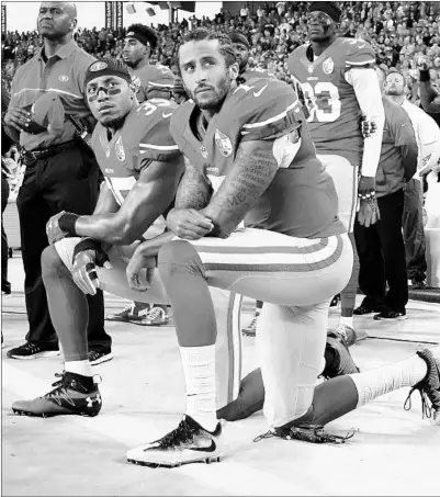  ?? THEARON W. HENDERSON/GETTY ?? Former 49ers quarterbac­k Colin Kaepernick was among the first athletes to protest racial injustice during the national anthem.