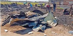  ?? ?? A FIRE destroyed seven dwellings in the Cathkin Informal settlement in Heideveld.