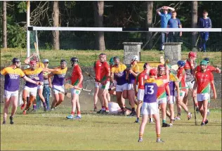  ??  ?? Controvers­y erupts in the goalmouth at the end of Saturday’s game in New Ross.