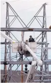  ?? ADOLPHE PIERRE-LOUIS/JOURNAL ?? PNM linemen work on the transfer station near Ladera and Ouray NW following an outtage caused by a lightning strike on Aug 8, 2016.