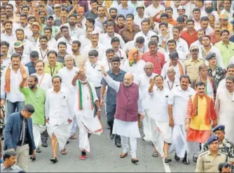  ?? HT FILE/VIVEK NAIR ?? BJP president Amit Shah leads a march in Kerala’s Thiruvanan­thapuram. In his speeches in the southern state, the 52yearold leader has vowed to oust the Left from its bastion, encapsulat­ing party’s efforts to expand across the country.