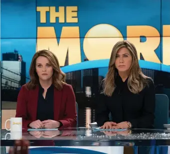  ??  ?? BACK ON THE AIR: Reese Witherspoo­n, left, and Jennifer Aniston return as TV news anchors in the Apple TV+ series ‘The Morning Show.’