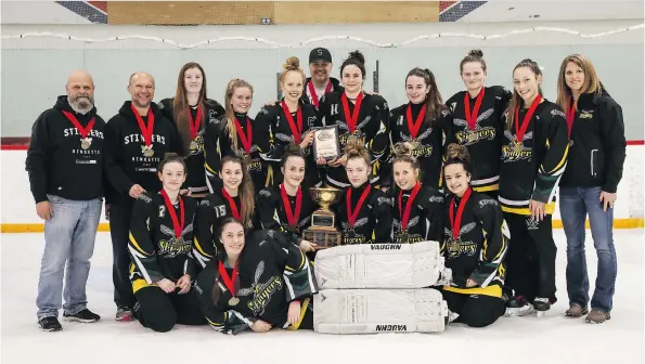  ?? POSTMEDIA NEWS ?? The Regina Stingers pose for a team picture after winning their second straight under-16 AA title at the Esso Golden Ring ringette tournament on Sunday in Calgary.