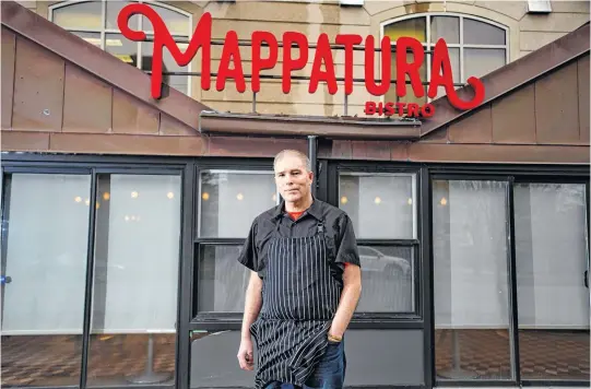  ?? RYAN TAPLIN • THE CHRONICLE HERALD ?? Terry Vassallo, co-owner of Mappatura with his partner Simone Mombourque­tte, outside his Spring Garden Rd. restaurant on Monday. Mappatura is shutting down its in-house dining for the time being and is focusing on takeout and curbside pickup.