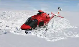  ?? Photograph: Polar Research Institute of China ?? A helicopter helps in the medical evacuation of an Australian expedition­er in Antarctica, in an operation which involved Australia, China and the US.