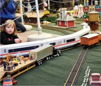  ??  ?? Indoors at Christkind­l, the multi-track miniature trains are a big attraction for wide-eyed little ones.